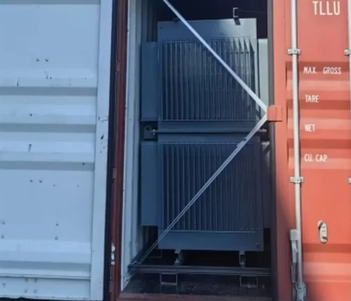 Distribution transformer loaded into a shipping container for export to Kenya